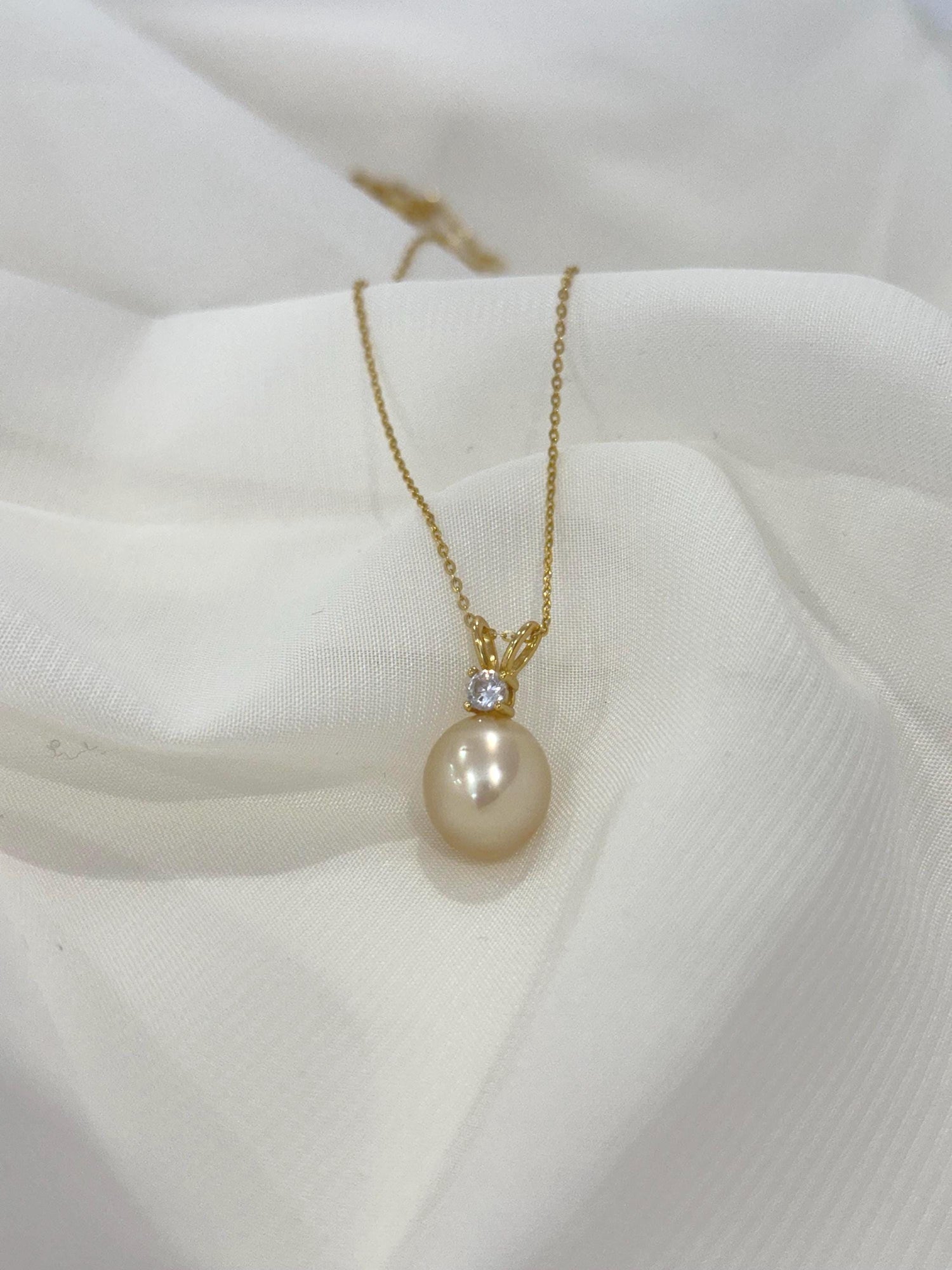 south sea gold pendant