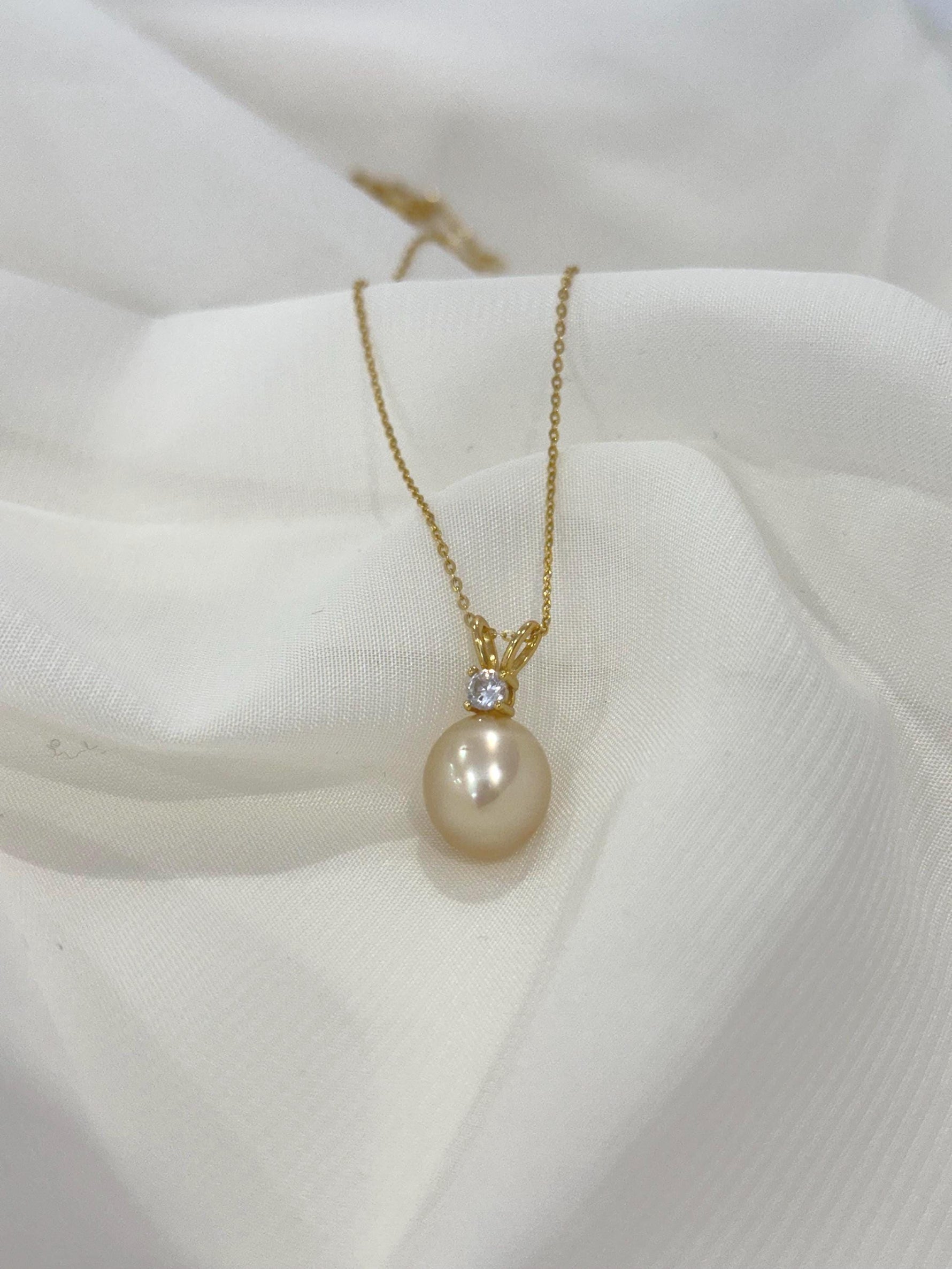 south sea gold pendant