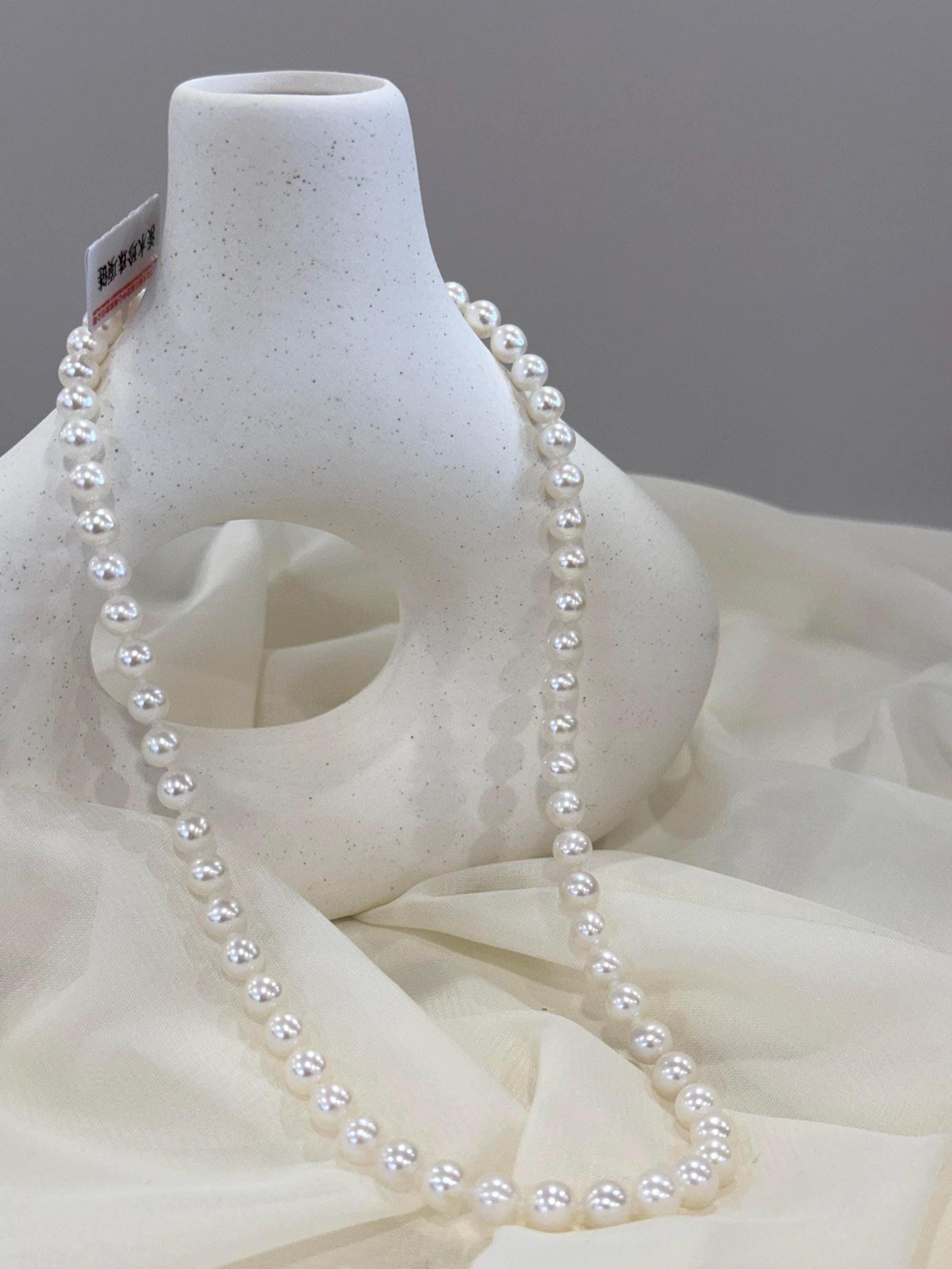 white pearl necklace