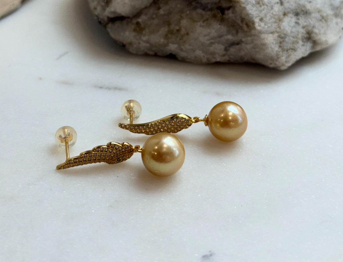 affordable freshwater golden pearls like south sea golden pearls s925 silver feather earrings for her