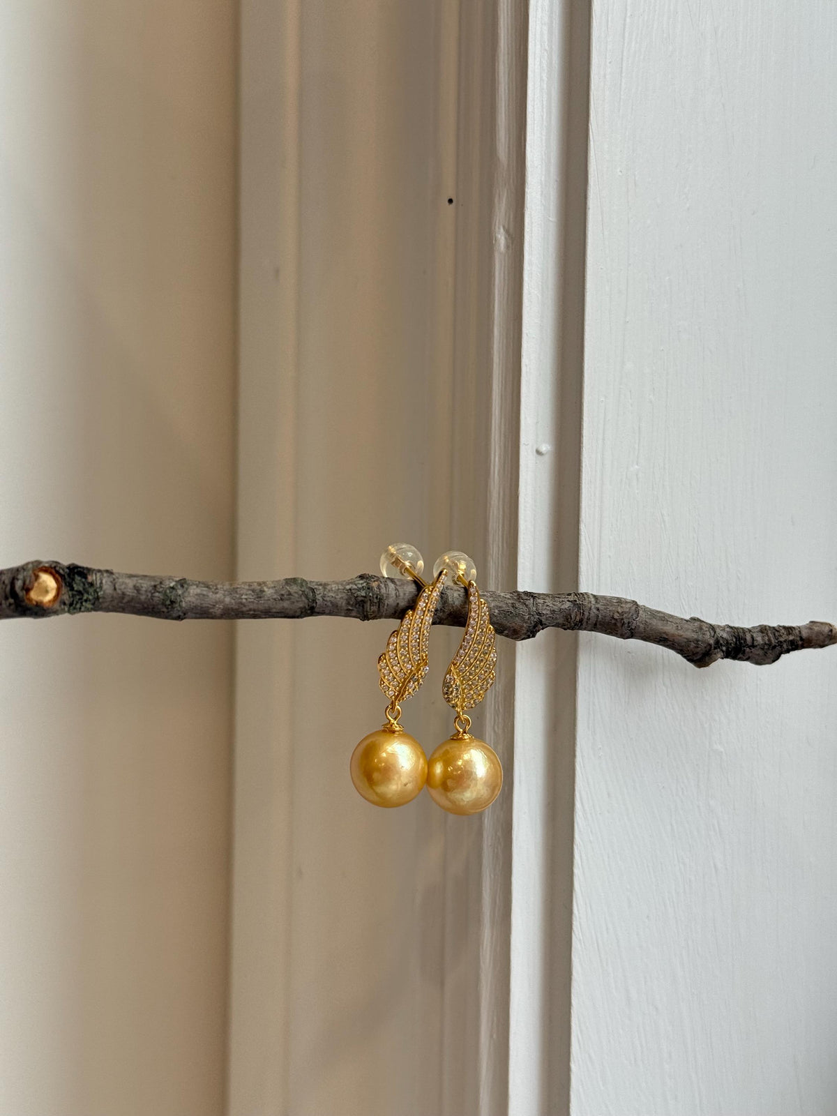 affordable freshwater golden pearls like south sea golden pearls s925 silver feather earrings for her daily wear