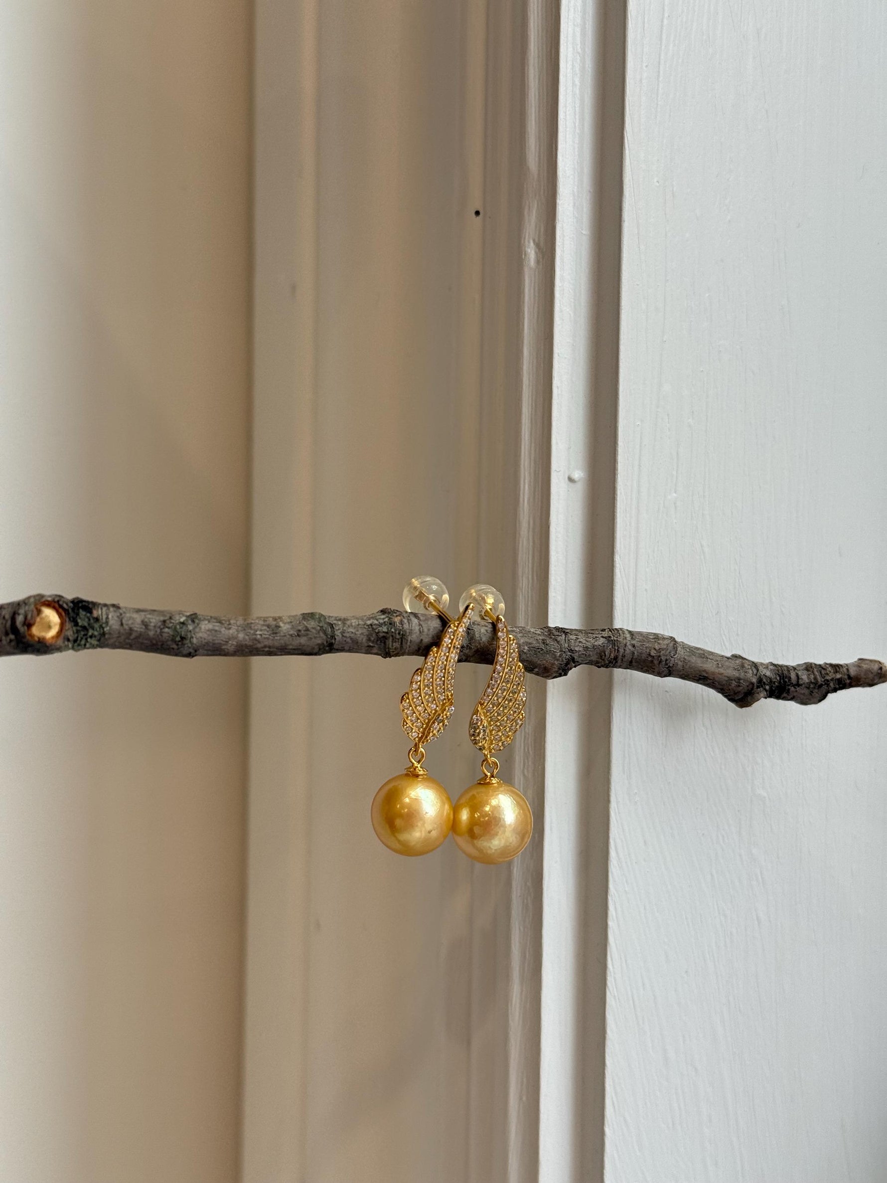 affordable freshwater golden pearls like south sea golden pearls s925 silver feather earrings for her daily wear
