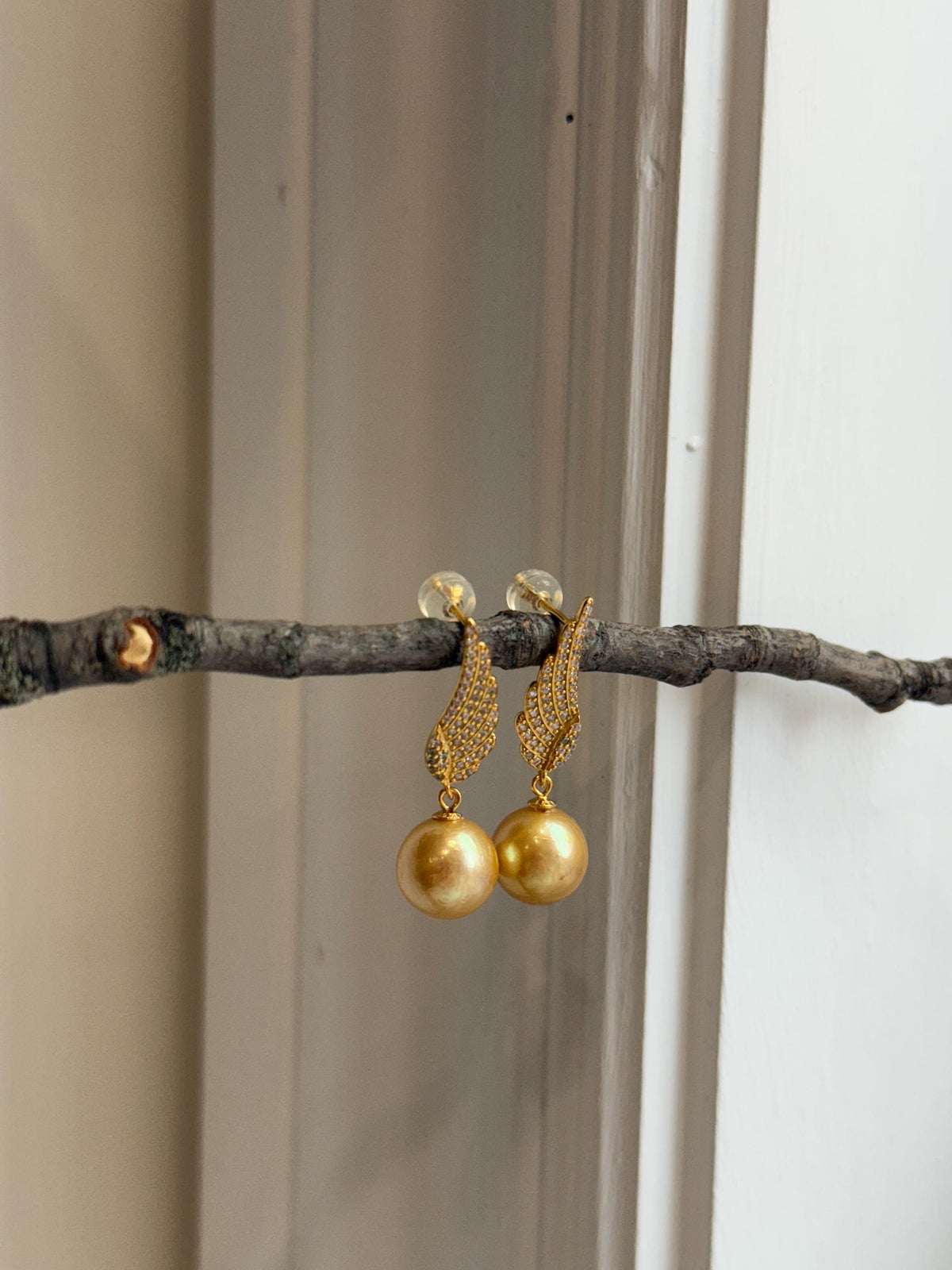 affordable freshwater golden pearls like south sea golden pearls s925 silver feather earrings for her office wear