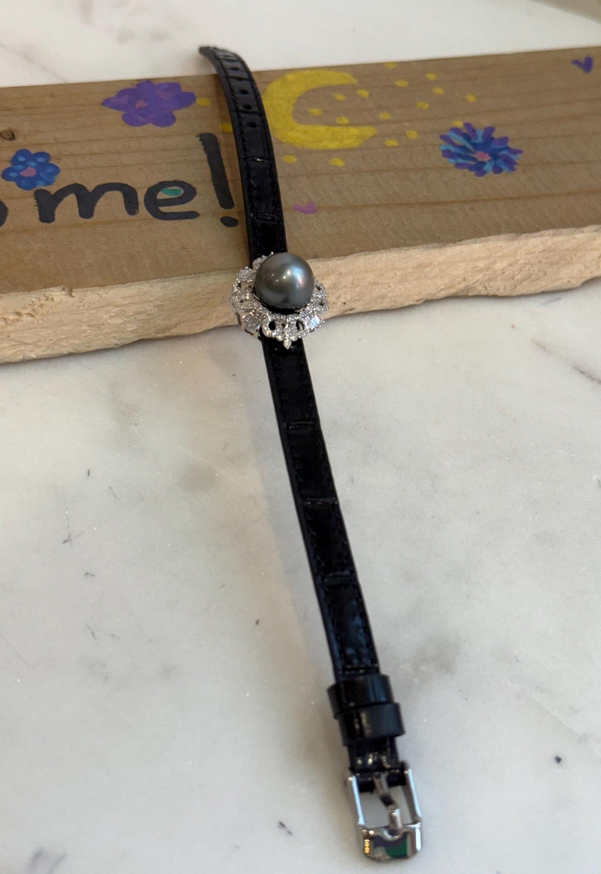 Tahitian Ocean Pearl Leather Strap Bracelet: 11.6mm extreme luster mirrored Platinum pearl, for 6.1”- 8” wrist.