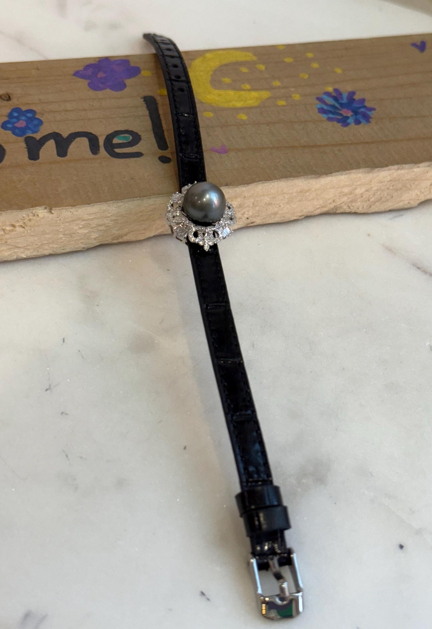 Tahitian Ocean Pearl Leather Strap Bracelet: 11.6mm extreme luster mirrored Platinum pearl, for 6.1”- 8” wrist.