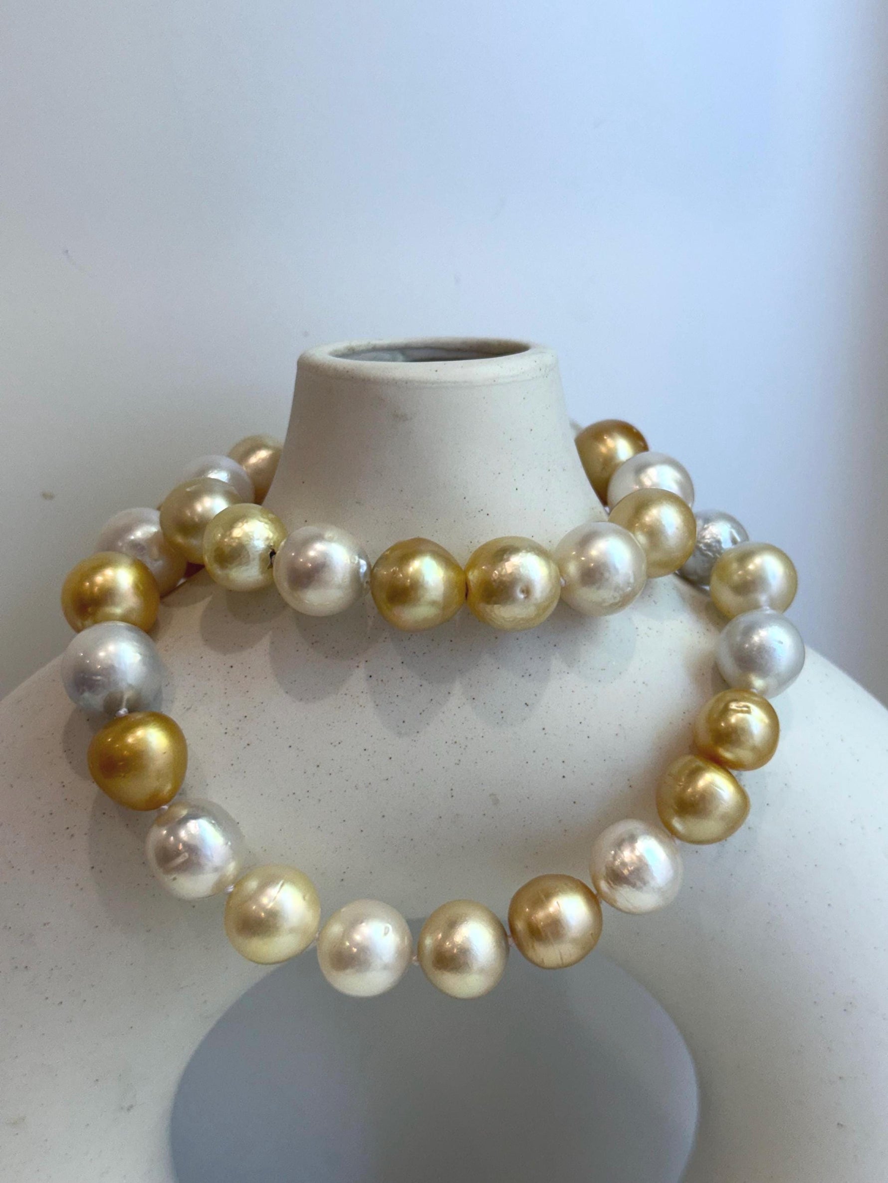 33pcs Strong luster South Sea Golden Australian Ocean White Pearls Necklace Strand: 10.7-12.8mm. Hand knotted 17.3” for her retirement