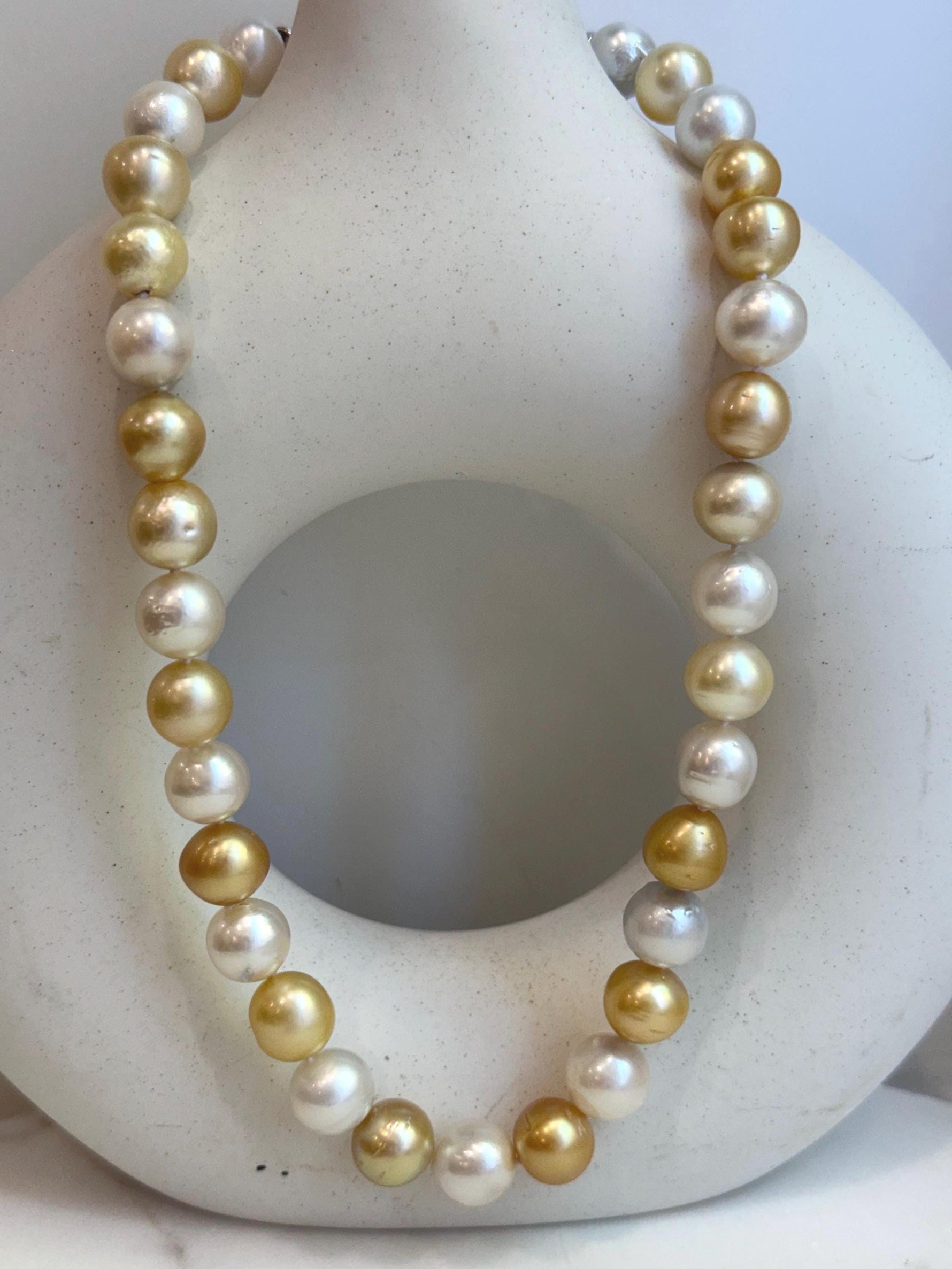 33pcs Strong luster South Sea Golden Australian Ocean White Pearls Necklace Strand: 10.7-12.8mm. Hand knotted 17.3”