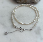 White small pearls necklace strand: Strong luster, 3.5-4mm long side, white iridescent Keshi pearls, s925 silver, to 16.9”.