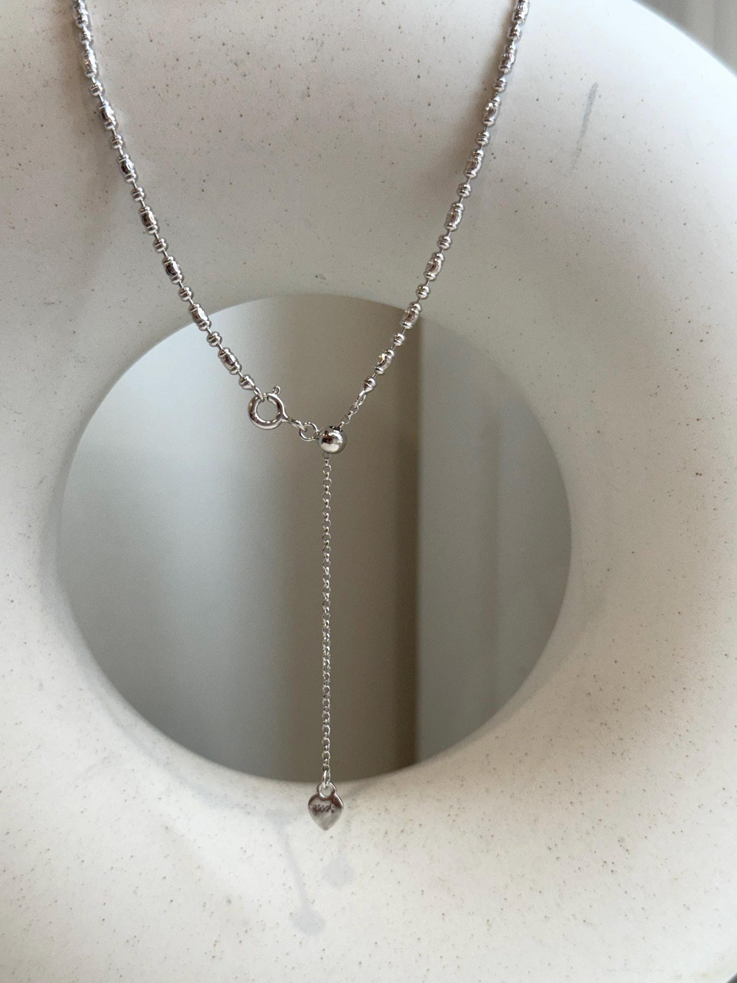 Not for seperate purchase!! 2mm thick s925 silver olive chain necklace, adjustable size to 20” long.