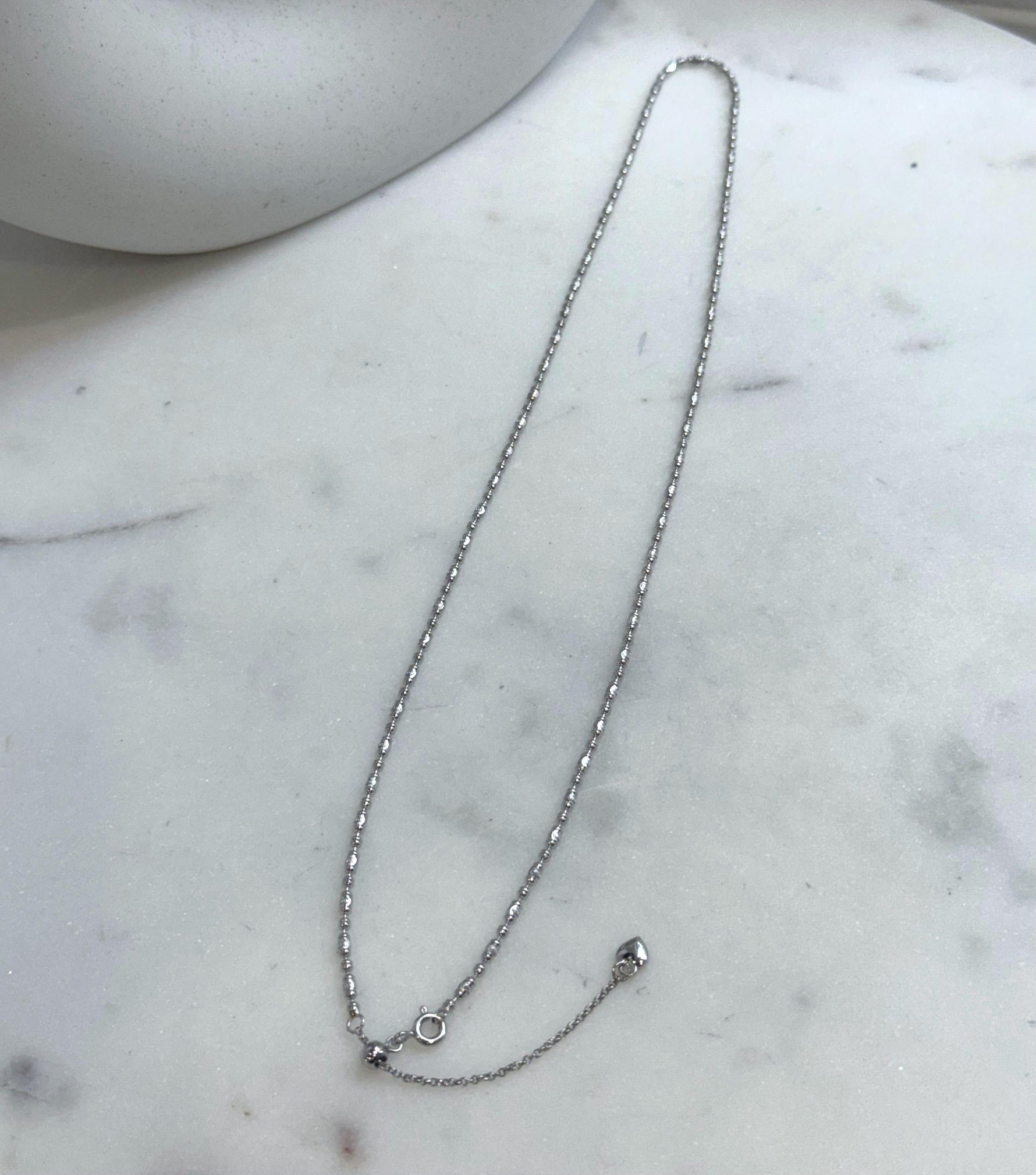 Not for seperate purchase!! 2mm thick s925 silver olive chain necklace, adjustable size to 20” long.