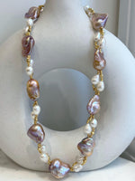 Baroque Rice Keshi Pearls Designed Necklace: 9pcs Extreme luster, peach rose iridescent, to 24mm, 18.3”