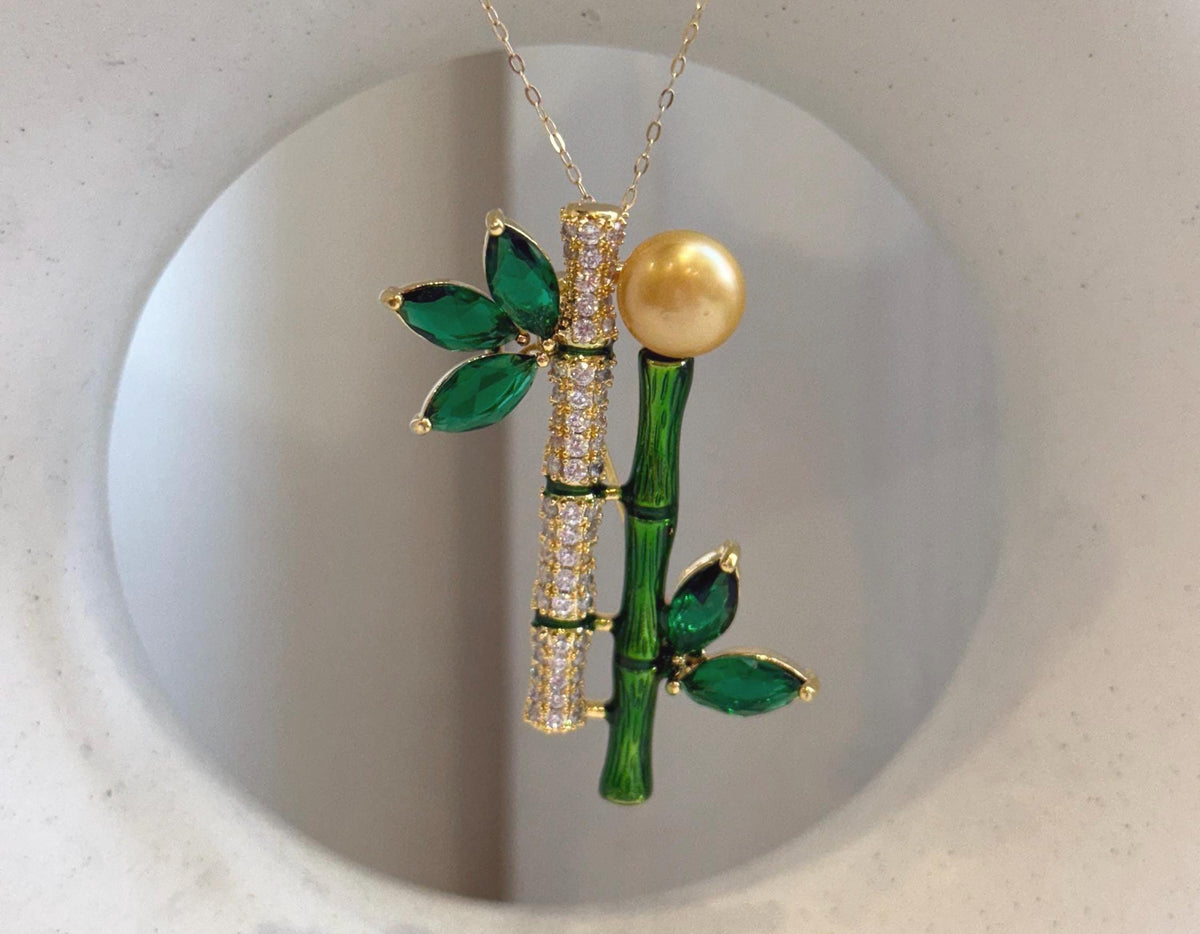 South sea golden pearl brooch pendant 2in1: Extreme luster mirrored, 9.5mm, ultra gold pearl, 2.3x4.8cm, Bamboo design Brooch.