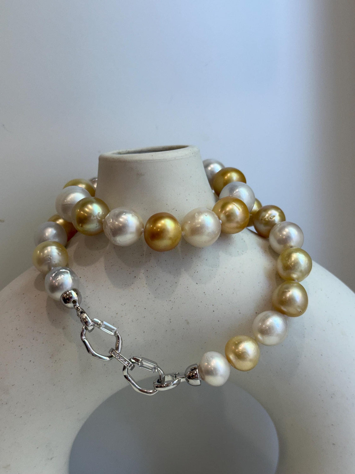 33pcs Strong luster South Sea Golden Australian Ocean White Pearls Necklace Strand: 10.7-12.8mm. Hand knotted 17.3”