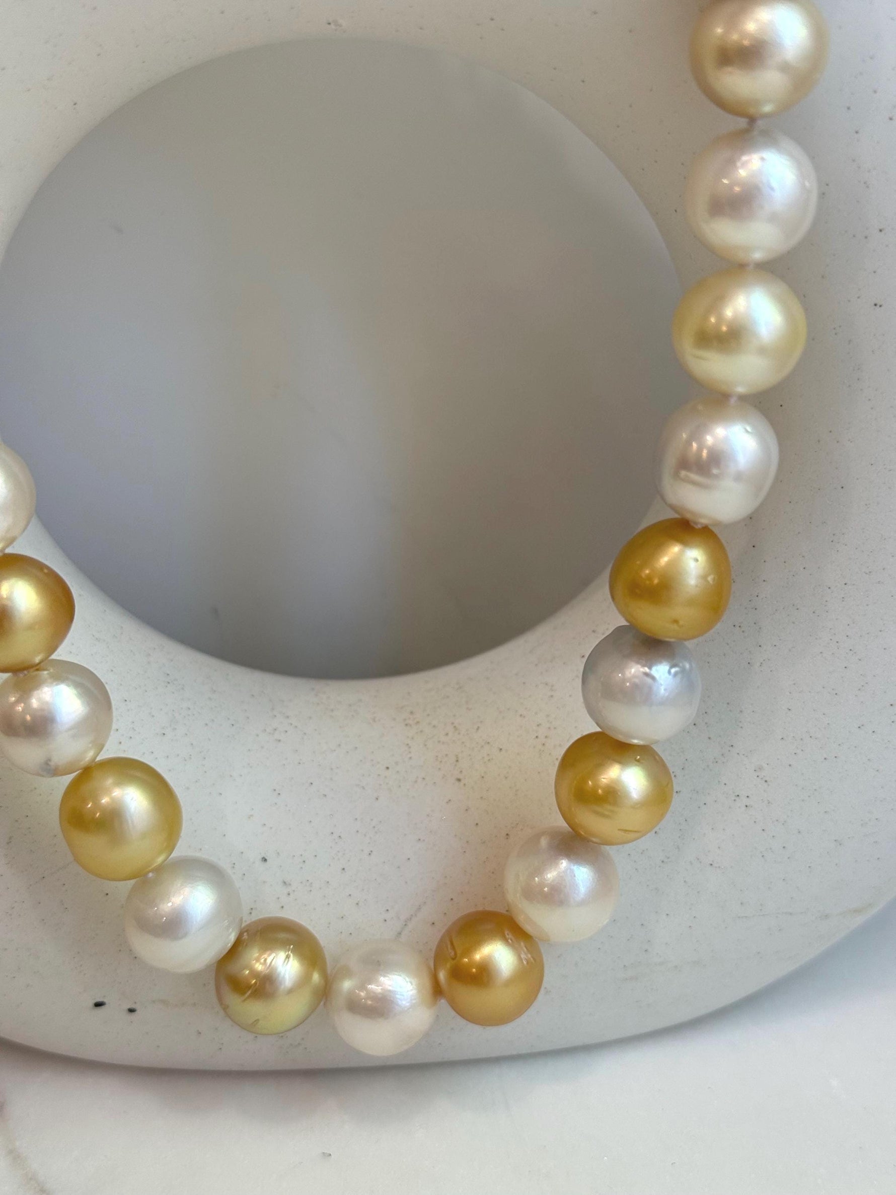 33pcs Strong luster South Sea Golden Australian Ocean White Pearls Necklace Strand: 10.7-12.8mm. Hand knotted 17.3”