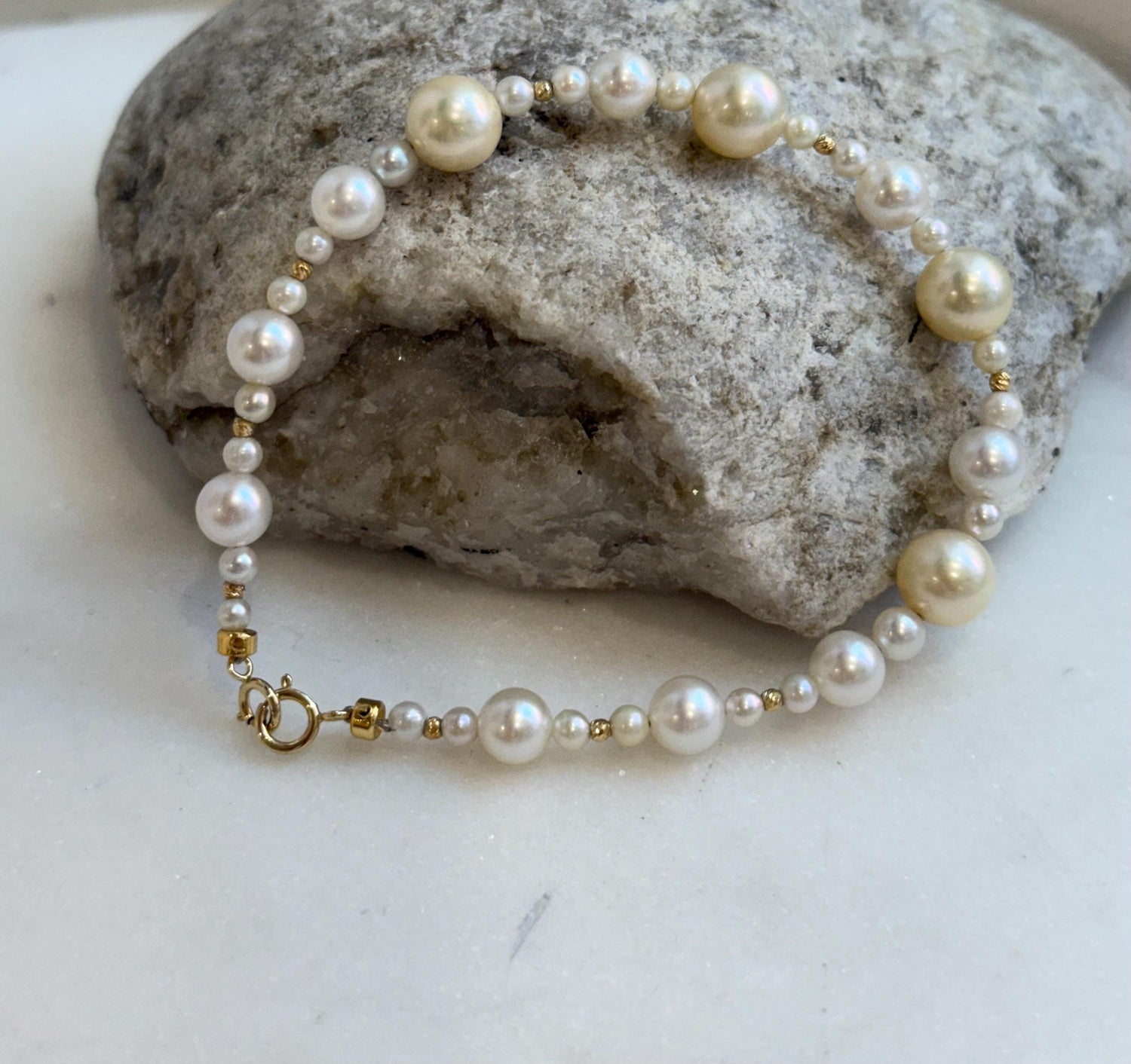 Au750 18K gold Akoya Ocean Pearls Bracelet: Extreme luster Mirrored effect, 5.5-7.6mm, 18k Gold beads clips, 7.1” long. No tariffs for her daily wear