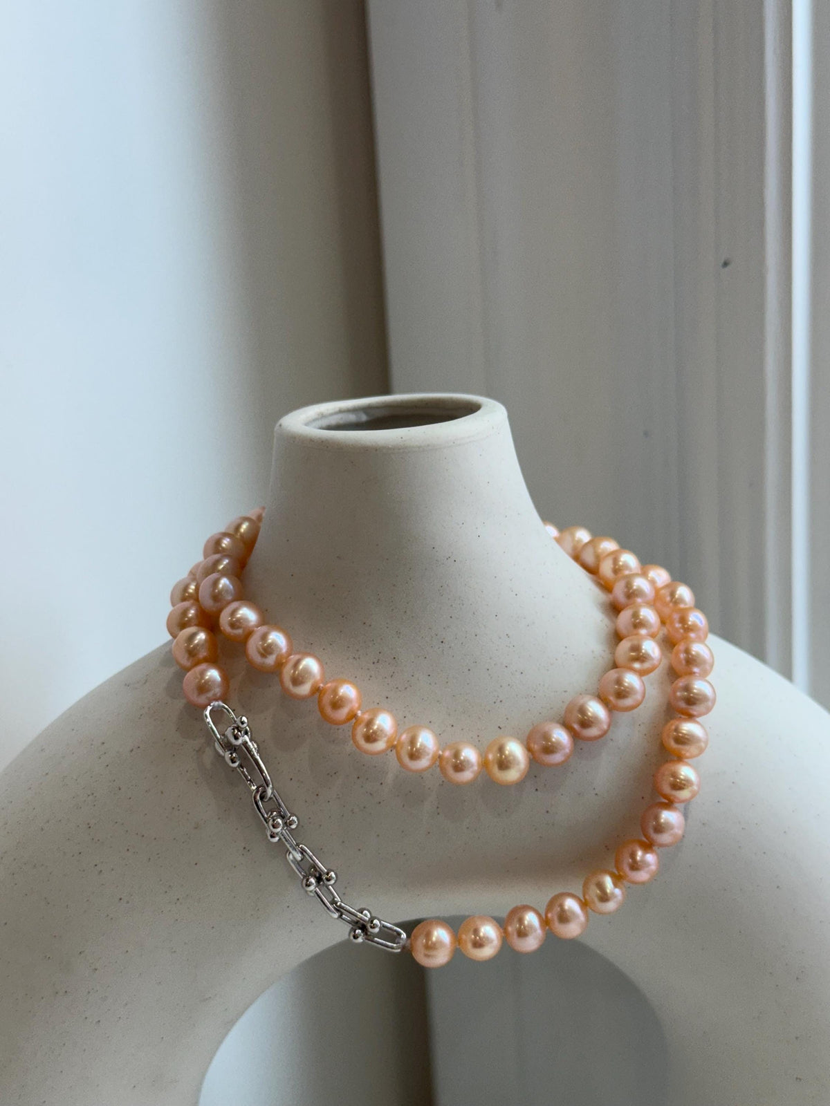 Peach Pearls Necklace: Extreme luster Mirrored effect, 6.2-6.7mm, S925 silver clips, knotted 17.8”long. No tariffs for her birthday