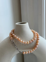 Peach Pearls Necklace: Extreme luster Mirrored effect, 6.2-6.7mm, S925 silver clips, knotted 17.8”long. No tariffs for her birthday