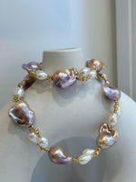 Baroque Rice Keshi Pearls Designed Necklace: 9pcs Extreme luster, peach rose iridescent, to 24mm, 18.3”