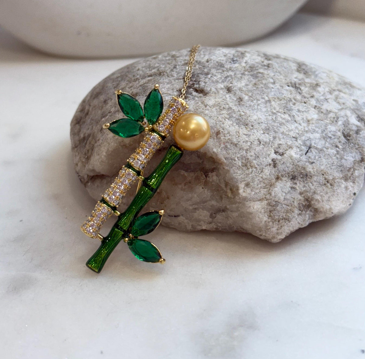 South sea golden pearl brooch pendant 2in1: Extreme luster mirrored, 9.5mm, ultra gold pearl, 2.3x4.8cm, Bamboo design Brooch.