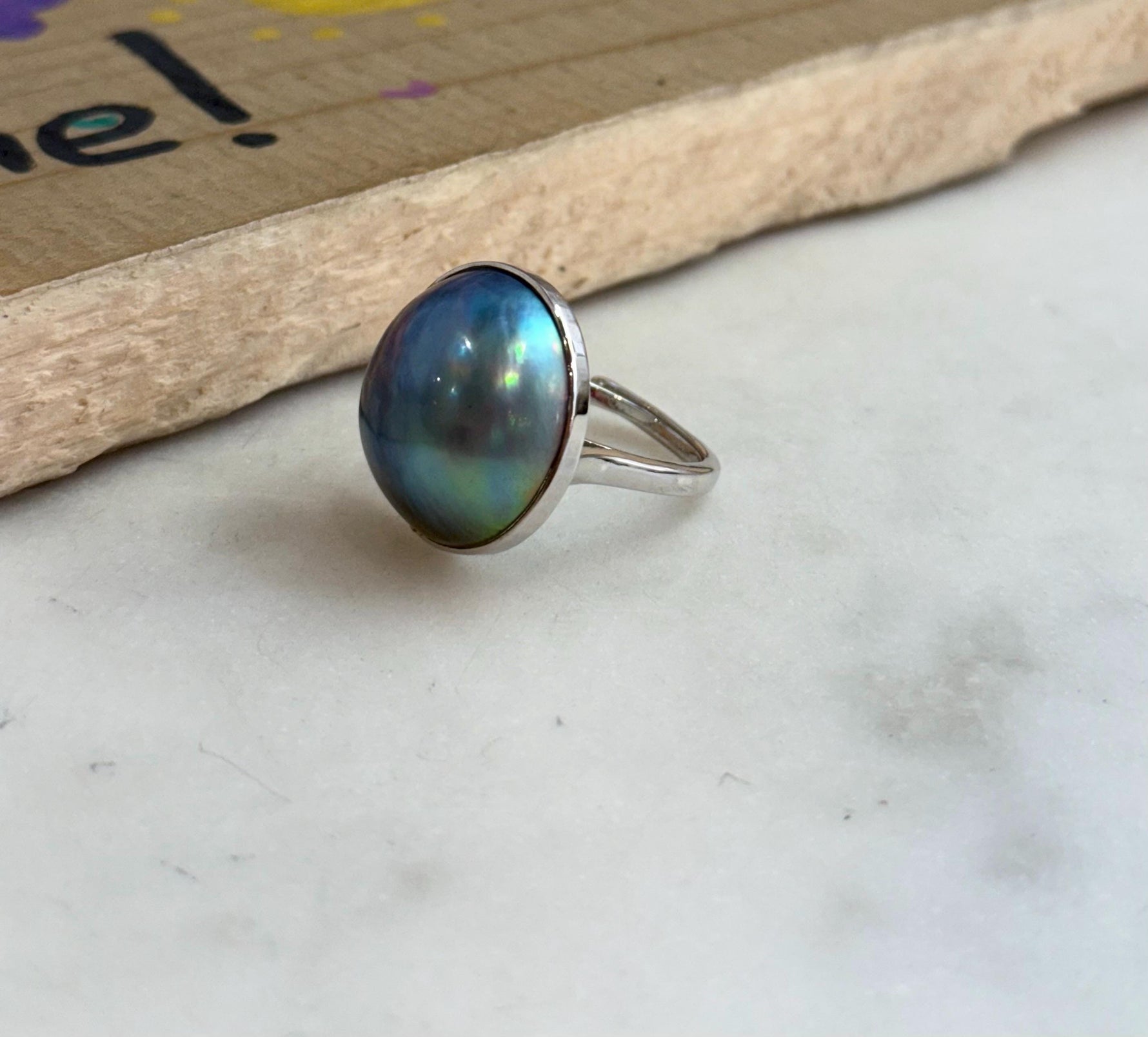 21mm Blue iridescent Ocean Round Mabe Pearl Ring: Extreme luster, S925 Silver base adjustable Ring.