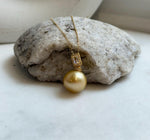15.1m South Sea deep golden Ocean Pearl pendant: Extreme luster mirrored, deep gold pearl, 2.5cm high, S925 silver pendant chain set.