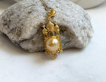11.4mm South sea golden Pearl pendant: Extreme luster mirrored, ultra gold pearl, 4.5cm high, S925 silver castle pendant chain set.