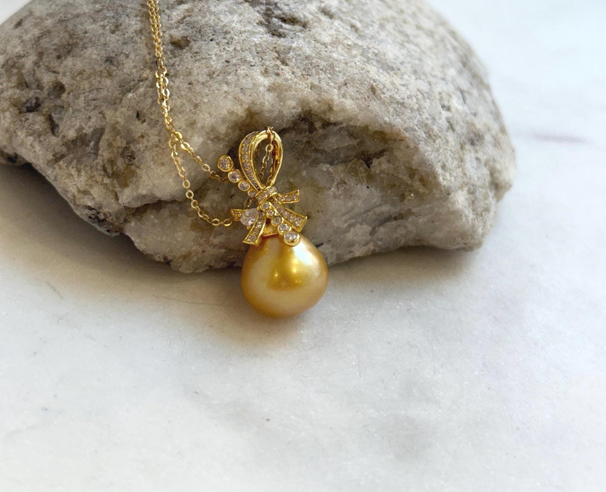 12.6mm South Sea Ocean deep Golden Butterfly bow Pendant:  Extreme Luster mirrored, 2.6cm high, S925 silver pendant chain set.