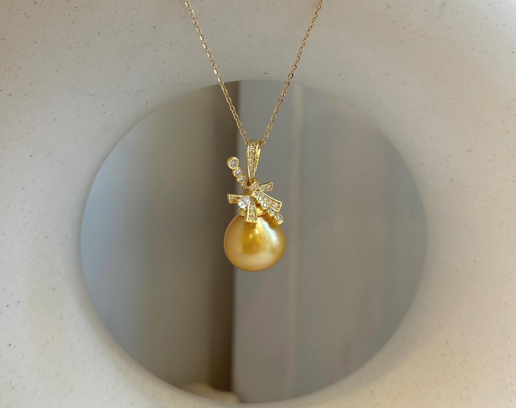 12.6mm South Sea Ocean deep Golden Butterfly bow Pendant:  Extreme Luster mirrored, 2.6cm high, S925 silver pendant chain set.