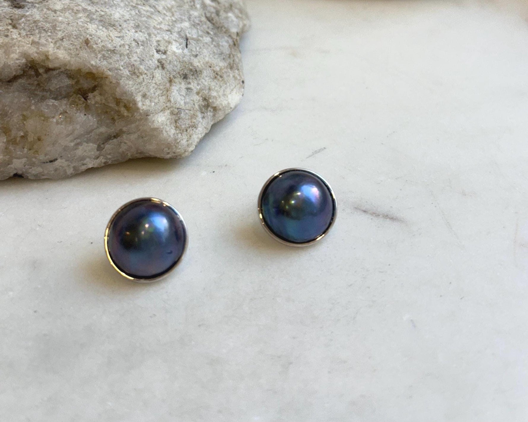 15mm ocean Mabe earrings: Extreme luster mirrored, blue purple pearls, s925 silver edges and studs.