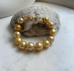 10.8-13.1mm 12pcs South sea golden Ocean Pearls bracelet: strong luster, gold to deep golden pearls,S925 silver bracelet. gift for her daily wear