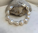 11pcs 12.4-14.6mm Baroque pearls Braclet: Extreme luster mirrored, 8.1”, S925 silver Braclet.