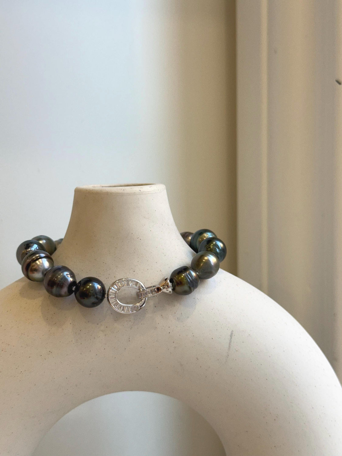 Elly’s 10.1-11.7mm 14pcs Tahitian Ocean peacock green huber Pearls Bracelet: Extreme luster, 8.1” knotted. Pearl jewelry idea.