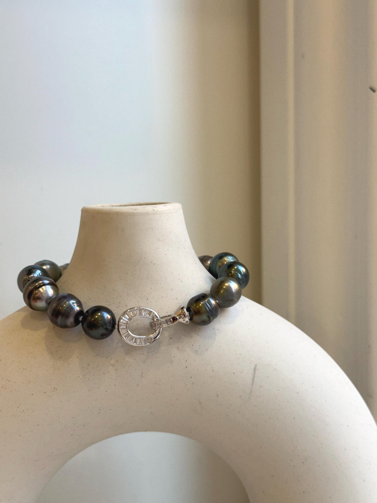 Elly’s 10.1-11.7mm 14pcs Tahitian Ocean peacock green huber Pearls Bracelet: Extreme luster, 8.1” knotted. Pearl jewelry idea.