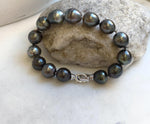 Elly’s 10.1-11.6mm 14pcs Tahitian Ocean peacock platinum huber Pearls Bracelet: Extreme luster, 7.8” knotted. Pearl jewelry idea.