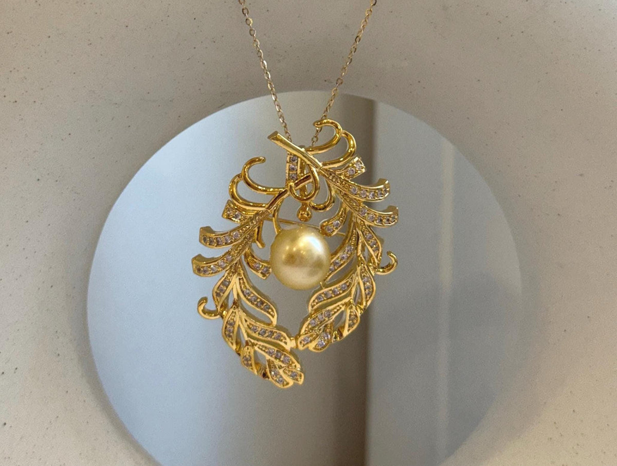 Elly’s South sea ultra golden pearl feathers brooch pendant 2in1: Extreme luster mirrored effect, 10mm. Pearl jewelry idea.