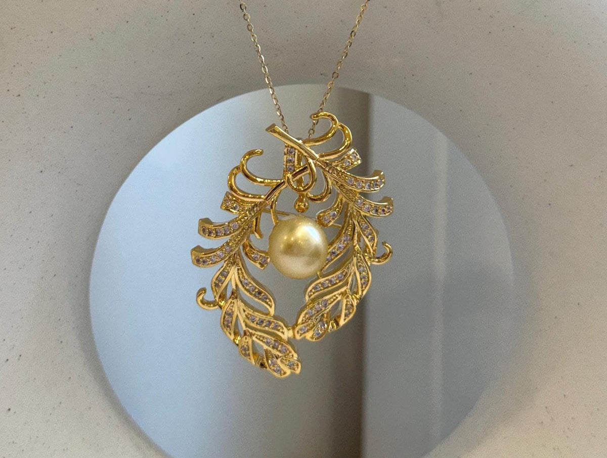 Elly’s South sea ultra golden pearl feathers brooch pendant 2in1: Extreme luster mirrored effect, 10mm. Pearl jewelry idea.