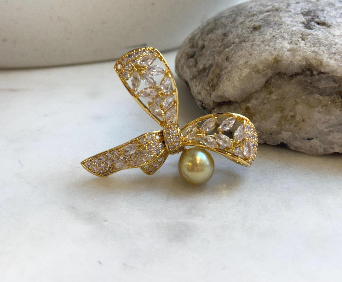 Elly’s South sea golden pearl butterfly bow brooch: Extreme luster mirrored, 9.6mm, deep gold pearl. Christmas Brooch.