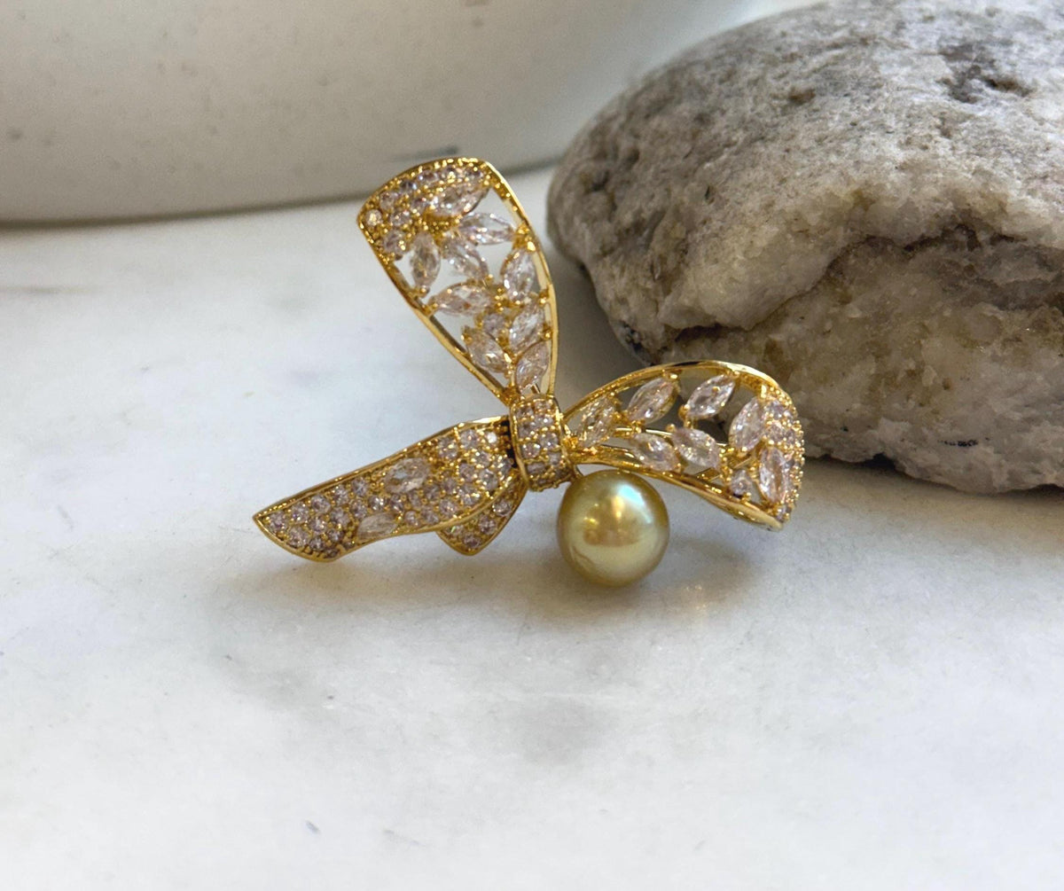 Elly’s South sea golden pearl butterfly bow brooch: Extreme luster mirrored, 9.6mm, deep gold pearl. Christmas Brooch.