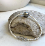 Elly’s 10.5mm Platinum Tahitian Ocean Freshwater white Pearls Bracelet: Extreme luster mirrored, 7.2”, S925 silver bracelet.