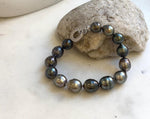 Elly’s 10.1-11.7mm 14pcs Tahitian Ocean peacock green huber Pearls Bracelet: Extreme luster, 8.1” knotted. Pearl jewelry idea. gift for her daily bracelet