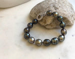Elly’s 10.1-11.7mm 14pcs Tahitian Ocean peacock green huber Pearls Bracelet: Extreme luster, 8.1” knotted. Pearl jewelry idea. gift for her holiday