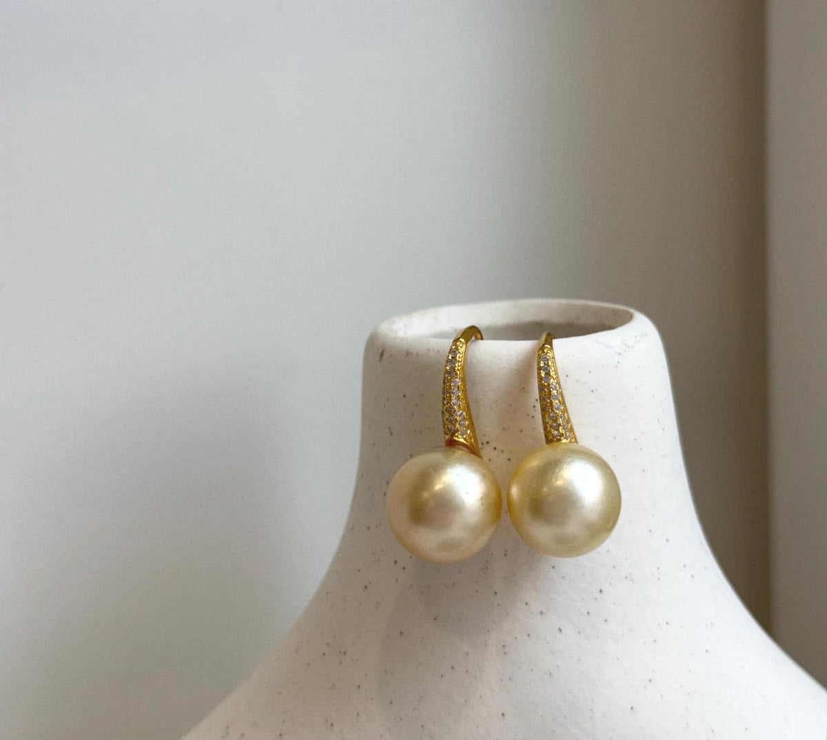Elly’s 12.5mm South sea light golden Pearls High heel Earrings Hooks: Extreme luster, 2.6cm high, S925 silver earrings with zircon.