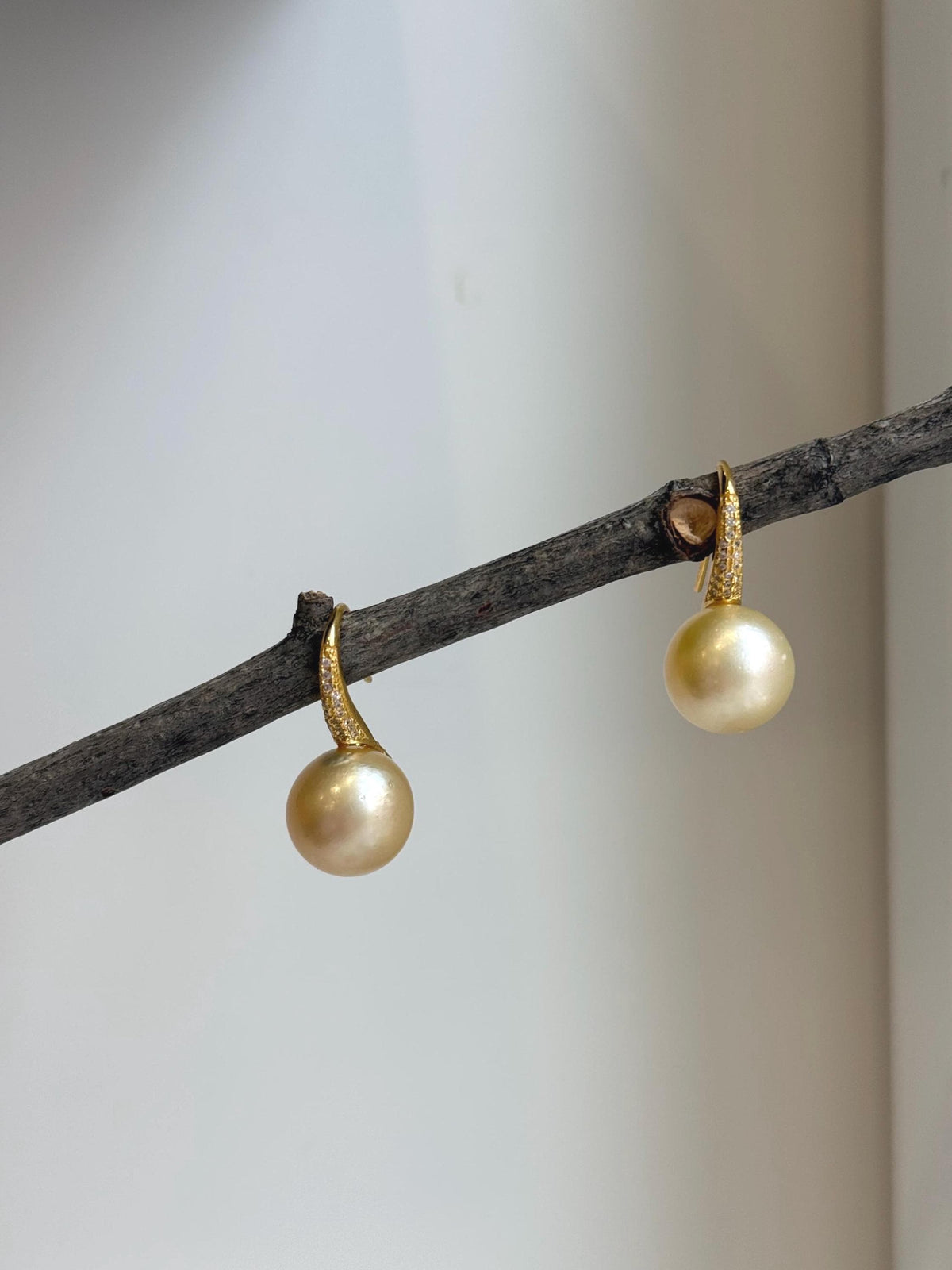 Elly’s 12.5mm South sea light golden Pearls High heel Earrings Hooks: Extreme luster, 2.6cm high, S925 silver earrings with zircon.