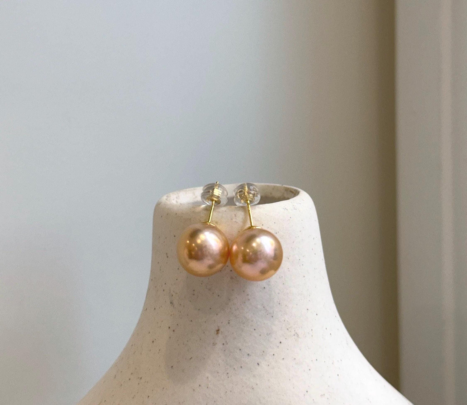 Elly’s 10.7mm Edison Pearls Earrings Studs: Extreme luster Mirrored, peach gold pearls, S925 silver earrings.