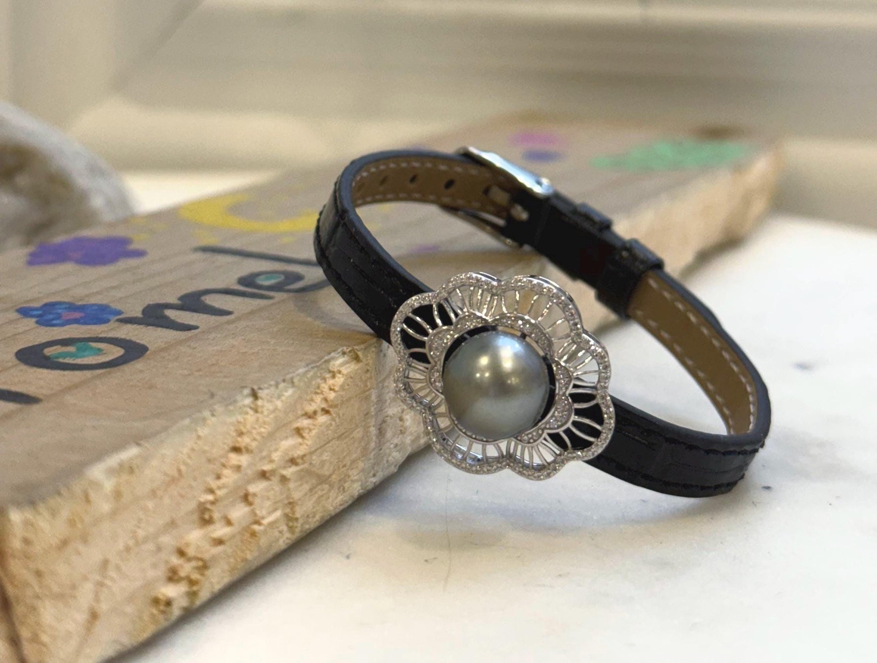 Elly’s 11.3mm Tahitian Platinum Ocean Pearl Genius Leather Strap Bracelet: extreme luster mirrored, for 6.1”- 8” wrist.