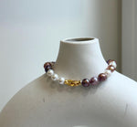 Elly’s 6.4-7.4mm Freshwater Pearls Bracelet: Extreme luster, 7.6” knotted, S925 silver clip bracelet with Amethyst.