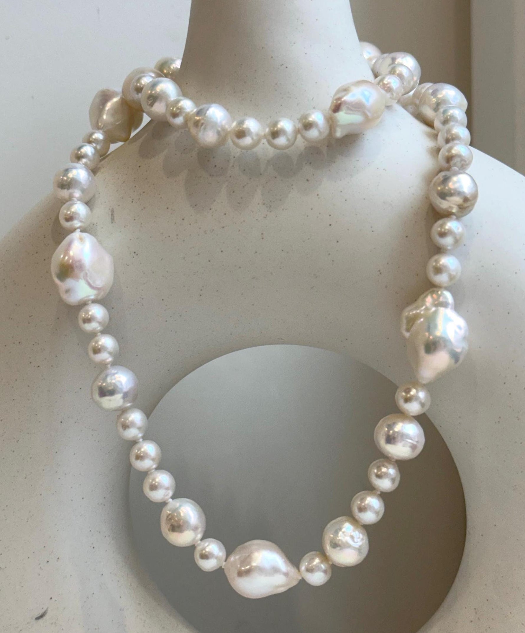 Elly’s 6.4-12.9mm White iridescent Pearls Necklace: Extreme luster, 20.9” knotted, S925 silver Necklace.