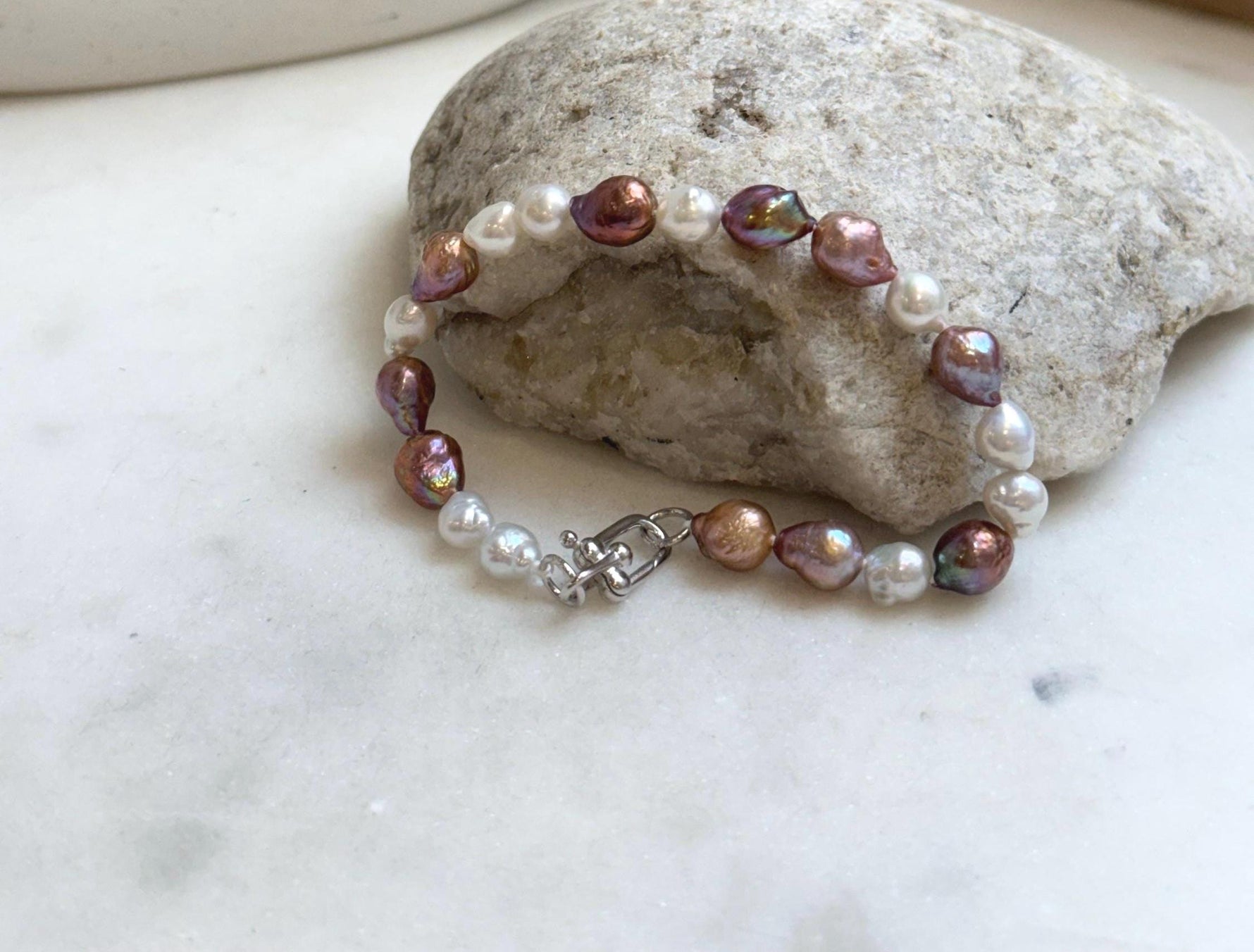 Elly’s 5-7.2mm Freshwater Pearls Bracelet: Extreme luster, 7.2” knotted, S925 silver clip bracelet.