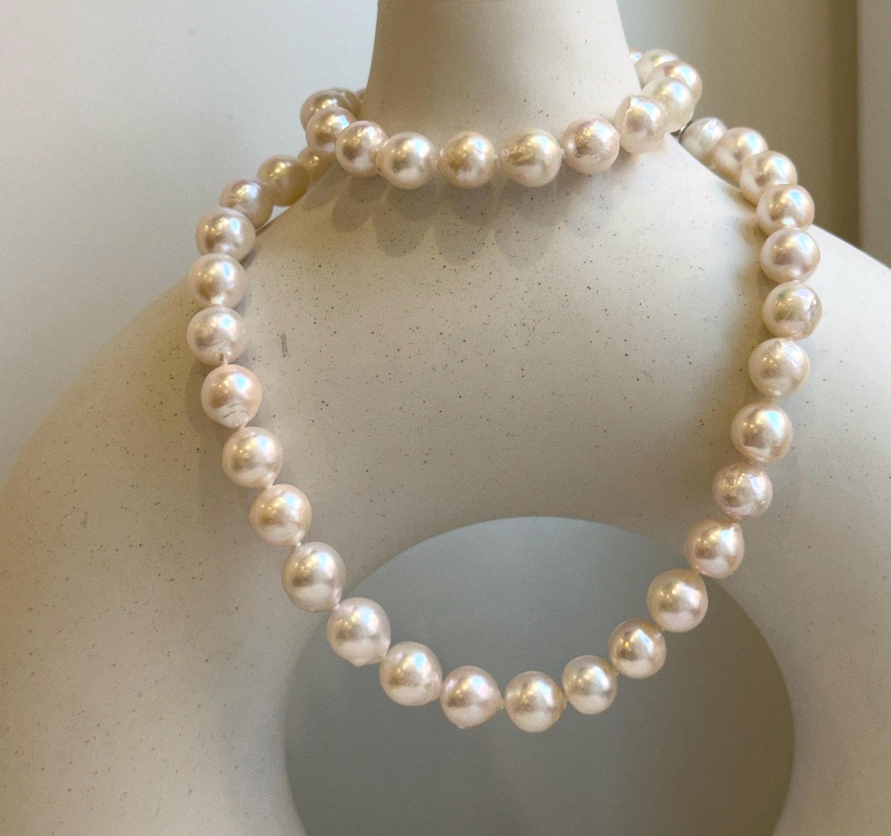 Elly’s 7.7-8.7mm 47pcs Akoya Ivory w/ pink hue ocean pearls necklace choker: Extreme luster mirrored, knotted, 18.2”, S925 silver necklace. gift for her