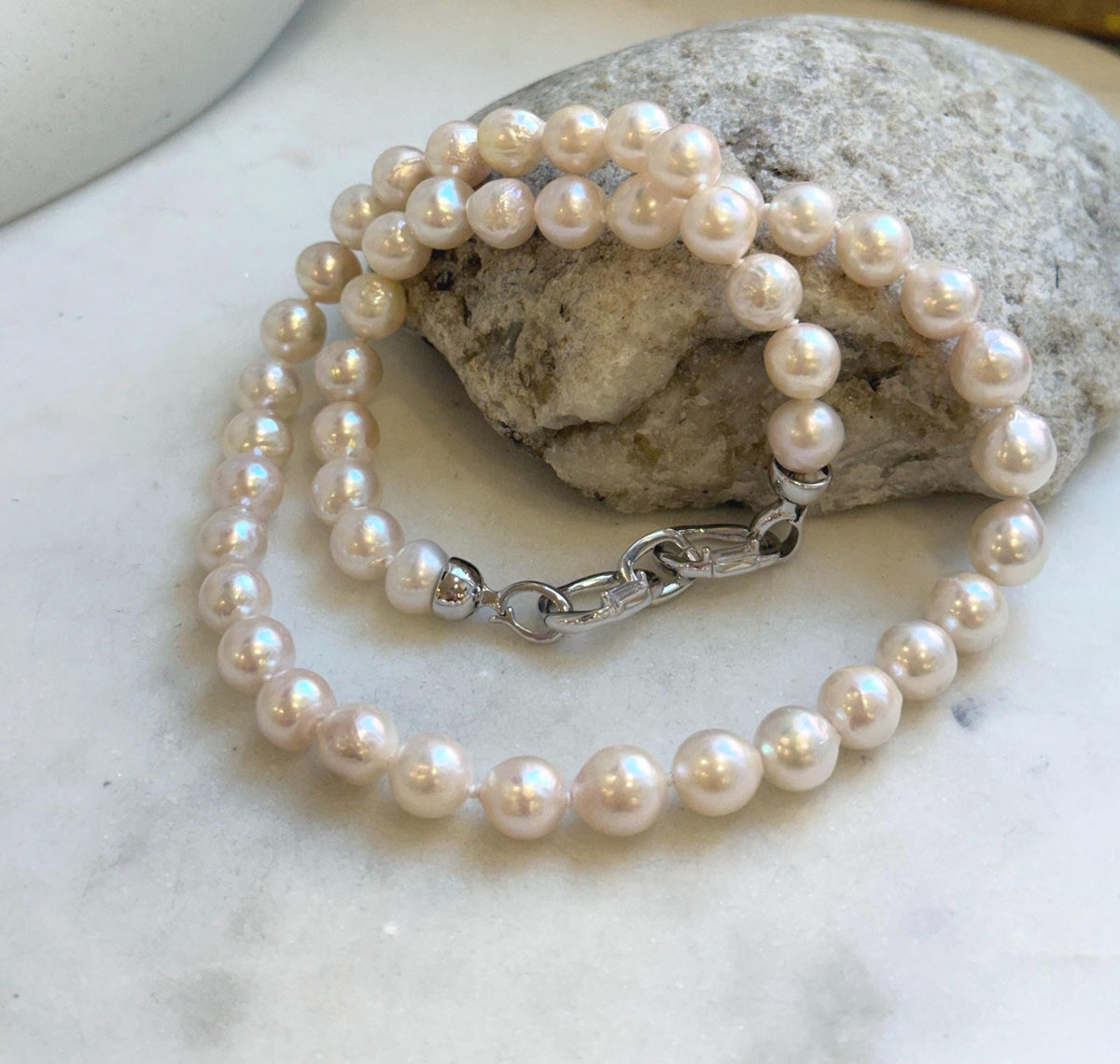 Elly’s 7.7-8.7mm 47pcs Akoya Ivory w/ pink hue ocean pearls necklace choker: Extreme luster mirrored, knotted, 18.2”, S925 silver necklace. gift for her
